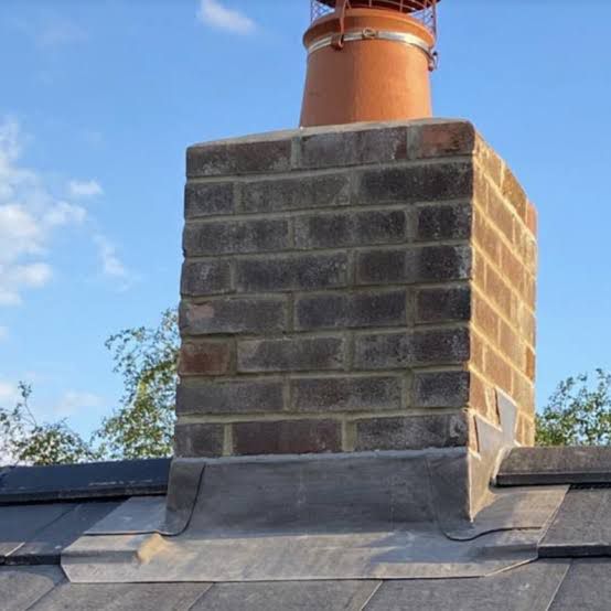Repointed chimney stack with new cowl and weatherproof flashing